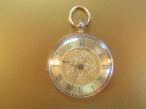 A ladies fob watch, cased stamped 18K, with damascened dial, black Roman