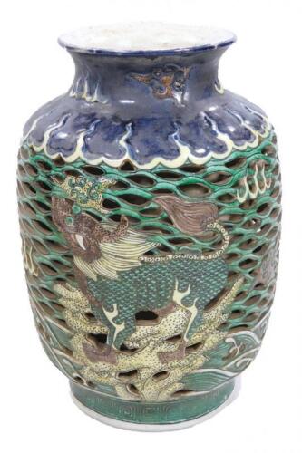 A Chinese reticulated double walled vase