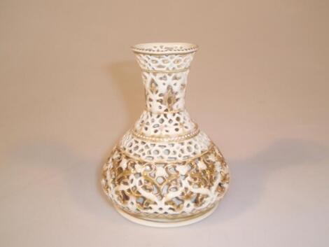 A Zsolnay pottery reticulated bottle vase