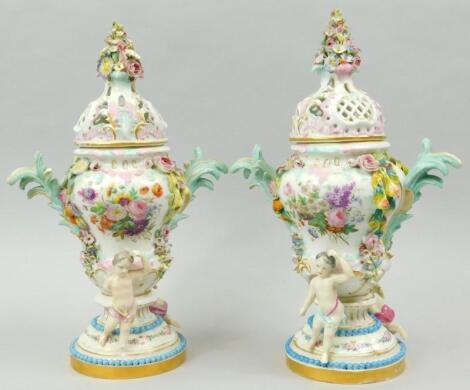 A pair of German porcelain Meissen style vases