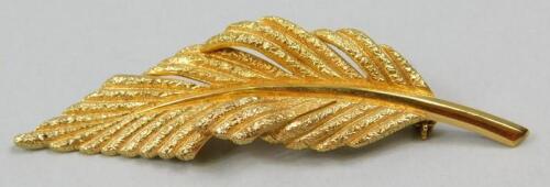 A leaf shaped bar brooch