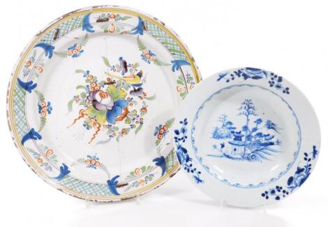 An early 18thC English Delft polychrome decorated plate