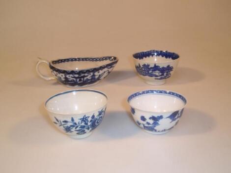 An 18thC English blue and white sauce boat