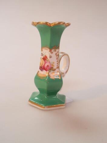 A 19thC porcelain taper stick