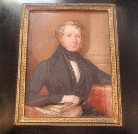 19thC School. Portrait miniature of a young man