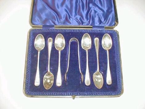 A set of six Edward VII silver teaspoons and matching sugar tongs by John Round