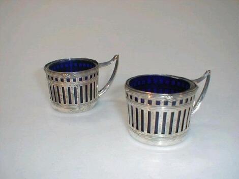 A pair of French silver drum salts