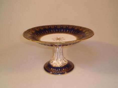 A 19thC porcelain pedestal cake stand