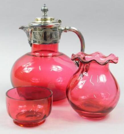 Three items of cranberry glass