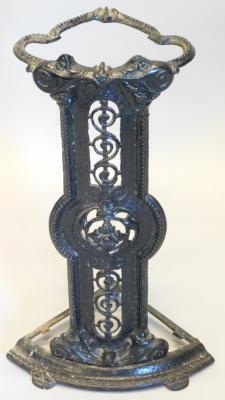 A Victorian Coalbrookdale style corner cast iron umbrella stand