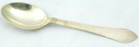 A Georg Jensen hammered sterling dessert spoon