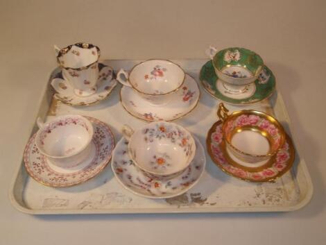 Six early 19thC and later decorative cups and saucers