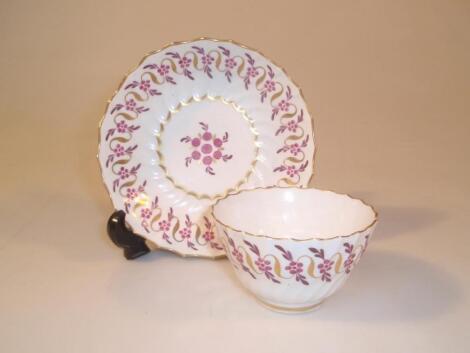 An 18thC Worcester spirally fluted tea bowl and saucer