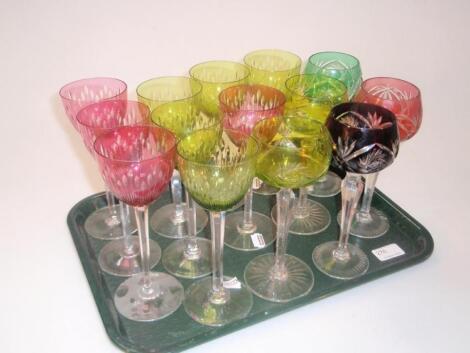 A quantity of coloured glass hock glasses