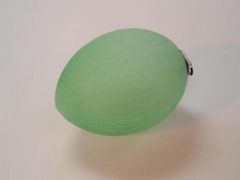 A green crackle glass bauble with metal hanging mount