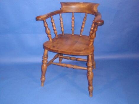 A stained beech smokers bow chair