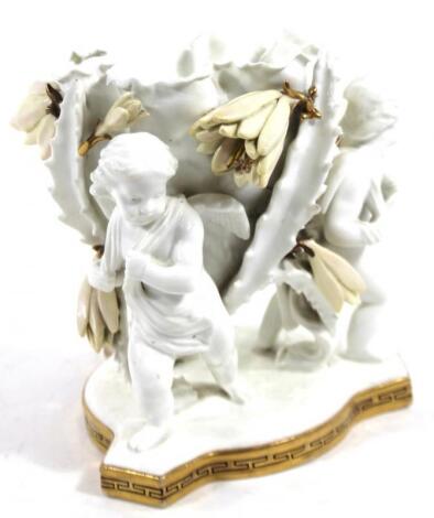 A 19thC Moore & Co porcelain centrepiece