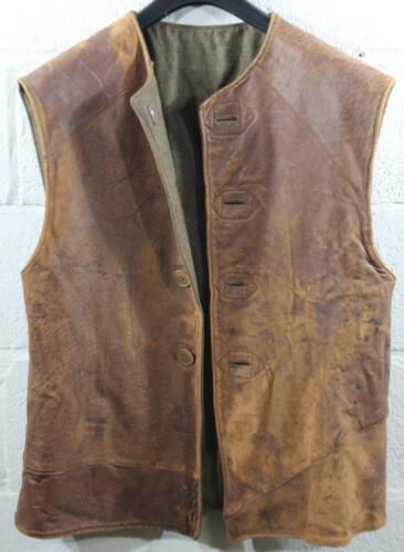 A mid 20thC army issue tanned leather sleeveless waistcoat