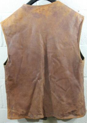 A mid 20thC army issue tanned leather sleeveless waistcoat - 3