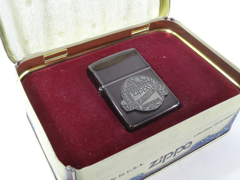 A Zippo 60th Anniversary lighter