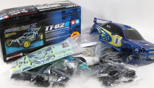 A Plasma Edge II TT-0TB remote controlled shaft driven car. (boxed)