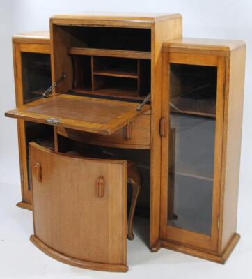 A mid 20thC Retro oak side by side bureau