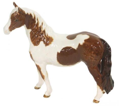 A Beswick Skewbald pony