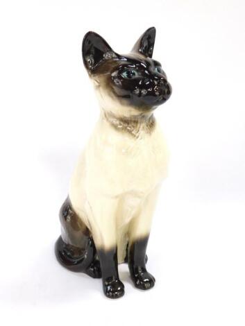 A Beswick pottery fireside model of a seated Siamese cat