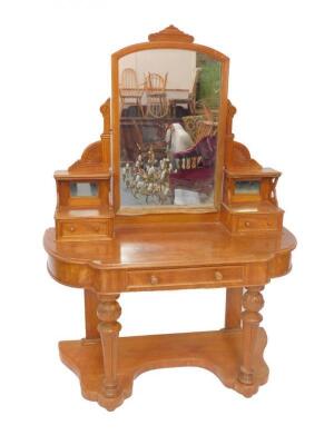 A Victorian satin walnut duchess dressing table