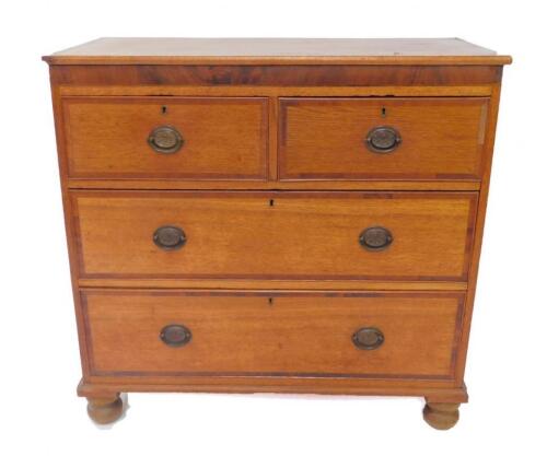 A George III oak and rosewood cross banded chest of drawers