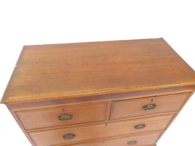 A George III oak and rosewood cross banded chest of drawers - 2