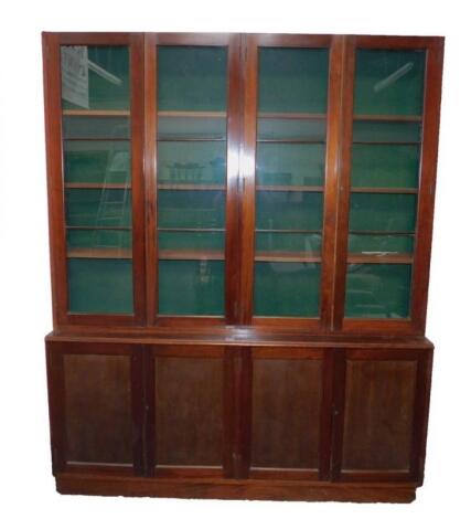 A mahogany cupboard bookcase