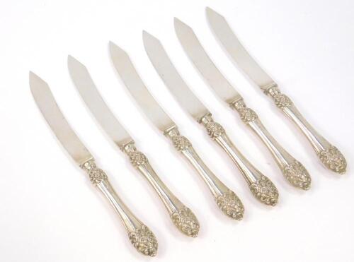 A set of six Edward VII silver handled steak knives