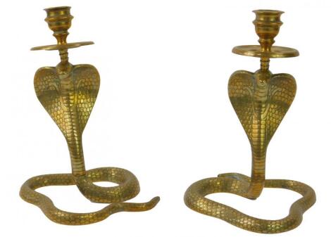 A pair of Indian 20thC brass candlesticks