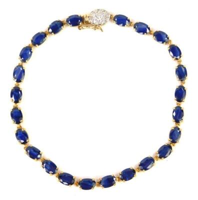 A 9ct gold and sapphire tennis bracelet