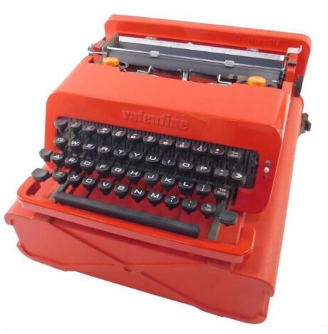 An Olivetti Valentine red typewriter