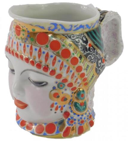 A Lomonosov mid 20thC porcelain jug modelled as a woman's head in traditional head dress
