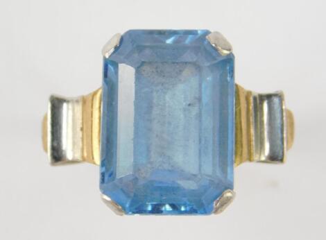 An aquamarine solitaire ring