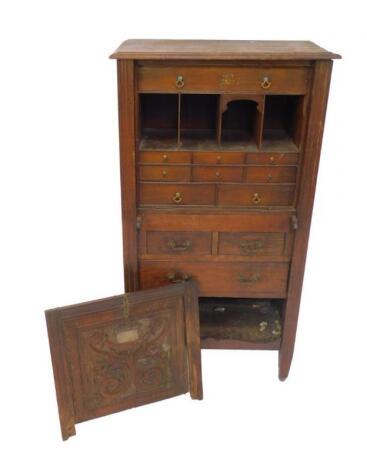 A Victorian oak secretaire chest