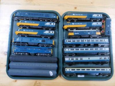 Nine various 00 gauge British Rail locomotives and seven various carriages