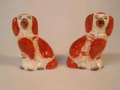 Pair of small Victorian Staffordshire comforter dogs