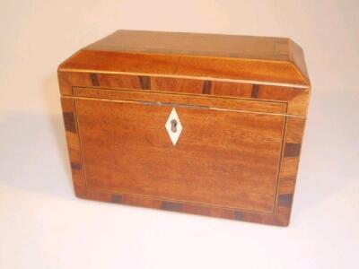 An early 19thC mahogany tea caddy