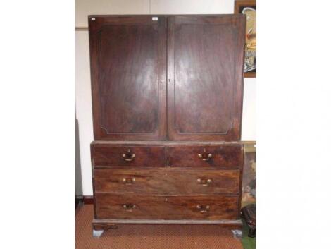 A George III mahogany press cupboard (AF)