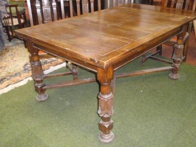 A heavy carved oak dining room suite comprising sideboard - 3