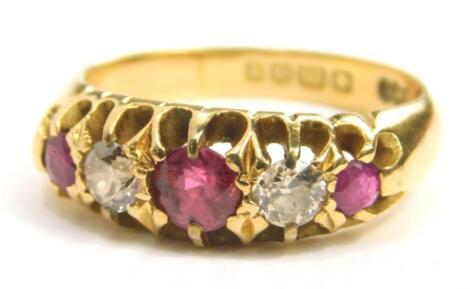 An 18ct gold ruby and diamond ring