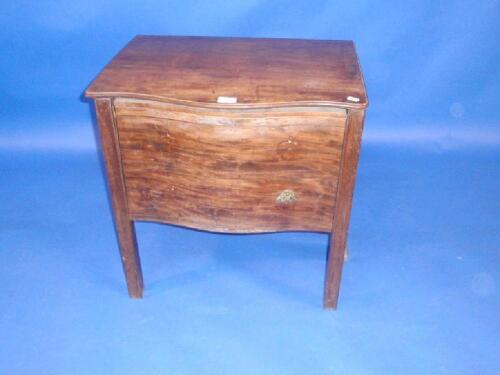 A Georgian mahogany serpentine box commode