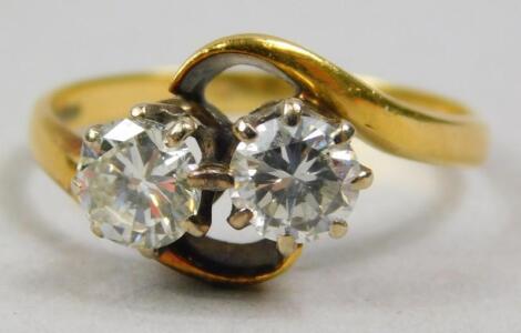 An 18ct gold two stone diamond dress ring