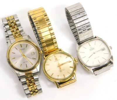 Three wristwatches