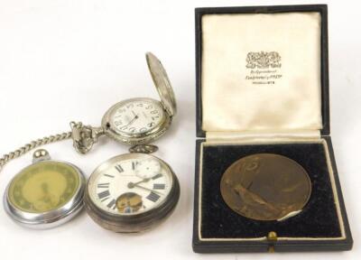 Three various pocket watches