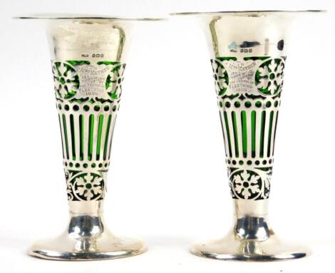 A pair of Edwardian pierced silver vases